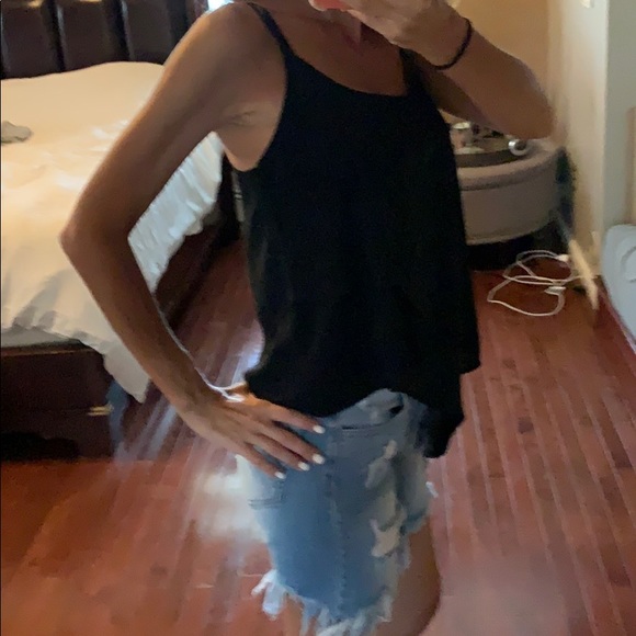 Asymmetrical black flows tank - Picture 2 of 4